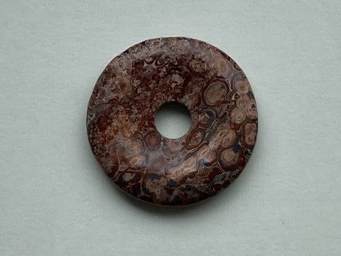 Leopardenjaspis Donut 40 mm – Schutz &amp; innere Stärke